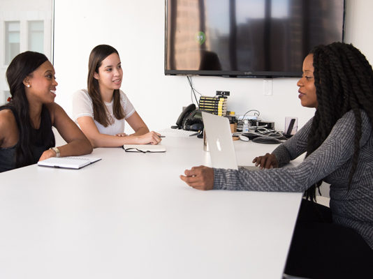 US Gender Wage Gap Narrows, But Black and Latina Women Are Still Being Left Behind Black and Latina women at work