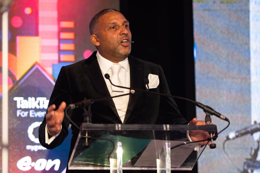 Paul Sesay, CEO of Inclusive Companies presenting at the 2024 Inclusive Awards 